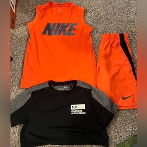 Lot of 3 youth medium under Armour and Nike - 2 shirts and 1 tank top $9